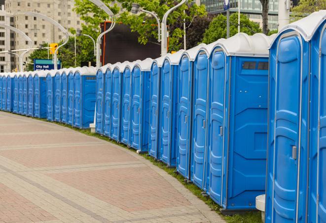 colorful portable restrooms available for rent at a local fair or carnival in Atherton